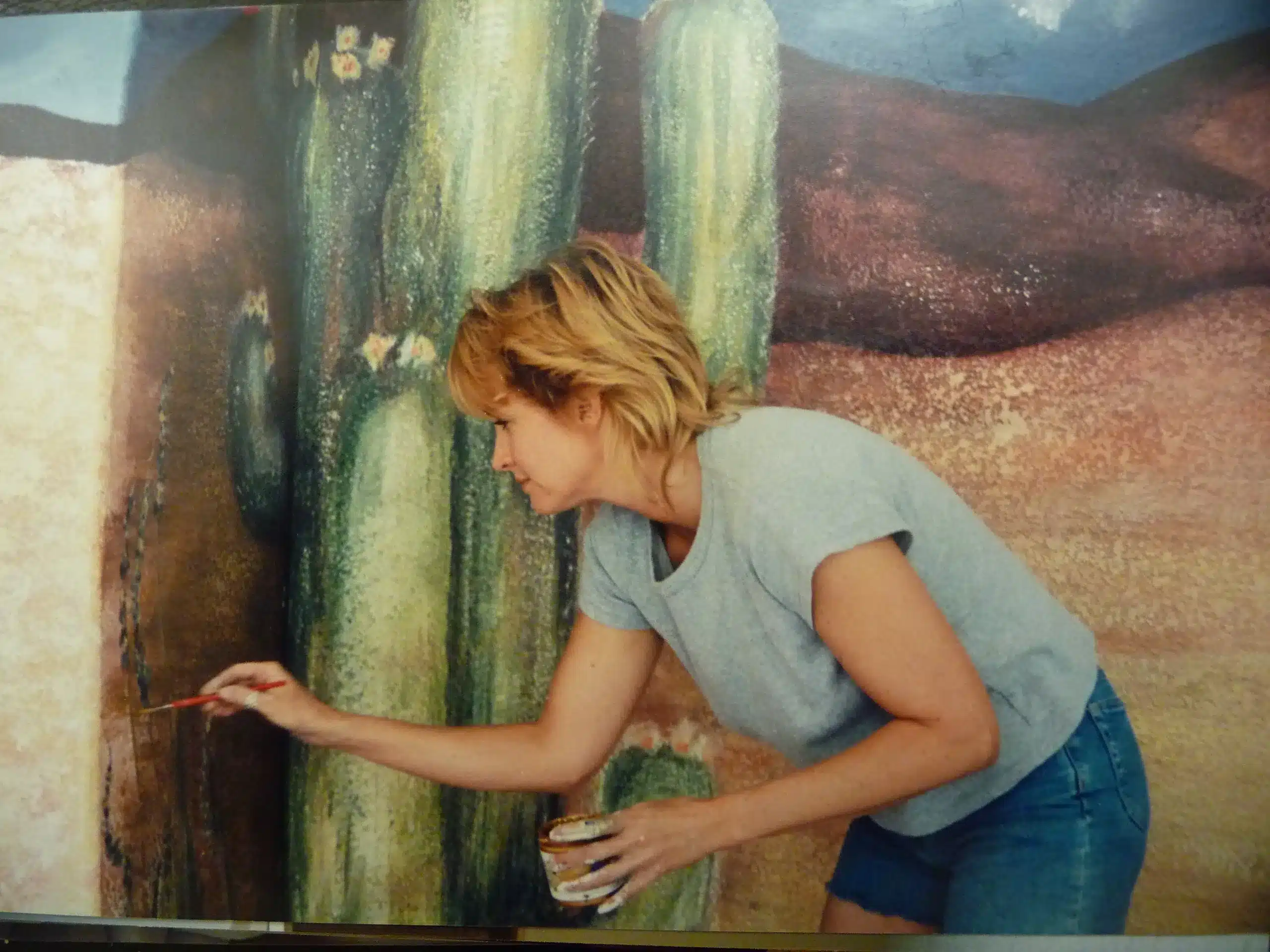 Juliana painting faux walls and murals